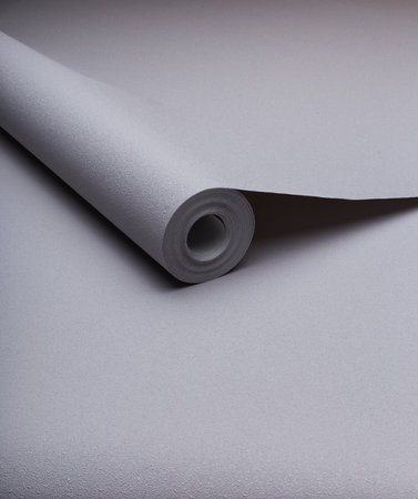 Large roll of wallpaper for the wall with a beautiful textureの写真素材