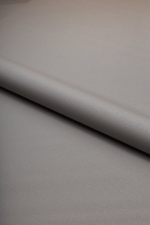 Large roll of wallpaper for the wall with a beautiful textureの写真素材