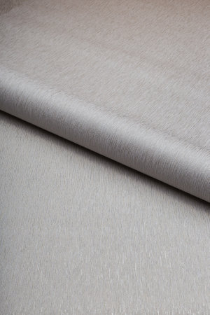 Large roll of wallpaper for the wall with a beautiful textureの写真素材