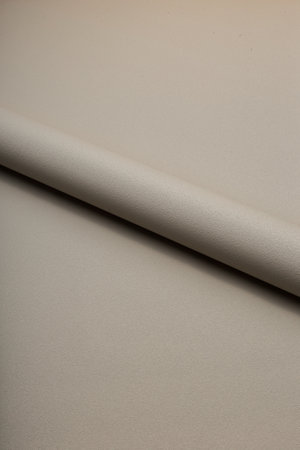 Large roll of wallpaper for the wall with a beautiful textureの写真素材