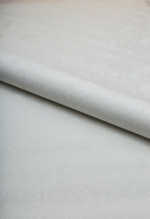 Large roll of wallpaper for the wall with a beautiful textureの写真素材