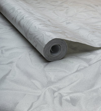 Large roll of wallpaper for the wall with a beautiful textureの写真素材