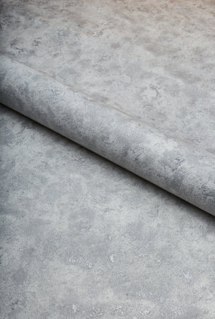 Large roll of wallpaper for the wall with a beautiful textureの写真素材