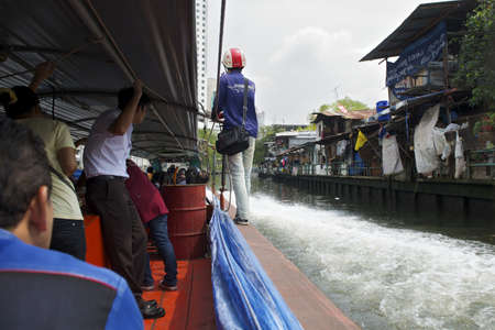 Bangkok, Thailand - February 24, 2011: Ride on an express passenger boat along the canal Khlong Saen Saeb (Saep).のeditorial素材