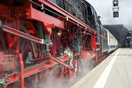Zurich, Switzerland - June 4, 2011: A steam train with a refrubished locomotive is leaving the main station in Zurich.のeditorial素材