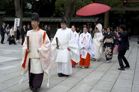 Tokyo, Japan - March 28, 2010: A shinto wedding ceremony at the famous Meiji shrine in Harajuku, Tokyo, Japan.のeditorial素材