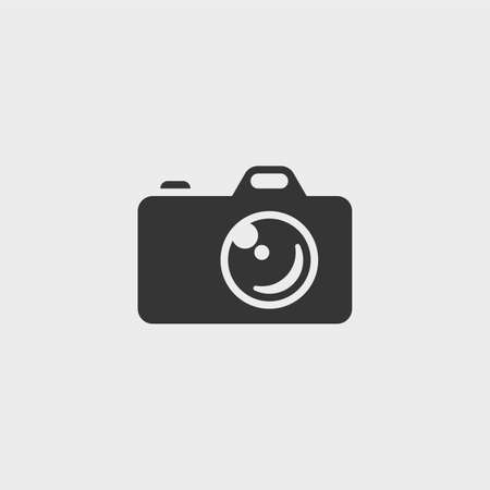 Photo camera. Simple monochrome vector icon or pictogramのイラスト素材