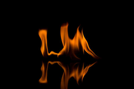 Fire flames on black backgroundの写真素材