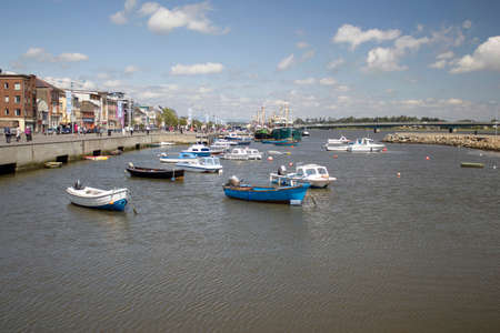 Picture present a river marina in Wexford town the capital of county Wexford.