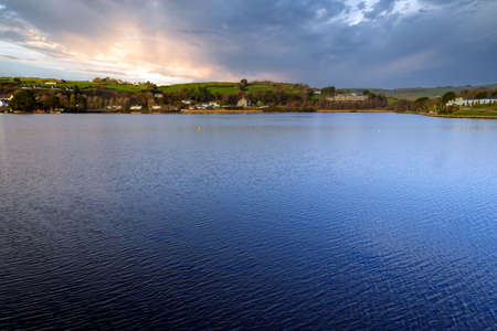 Panorama of the Roscaberry village seen across the lagoon.County Cork,Ireland.の写真素材