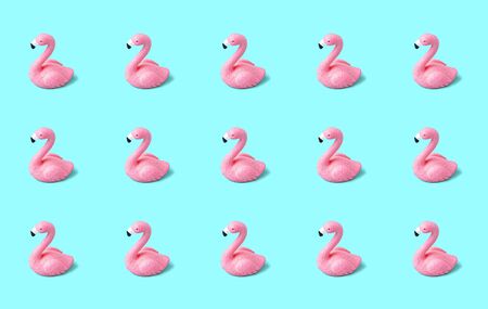 Pink flamingo seamless pattern on light blue background.の写真素材