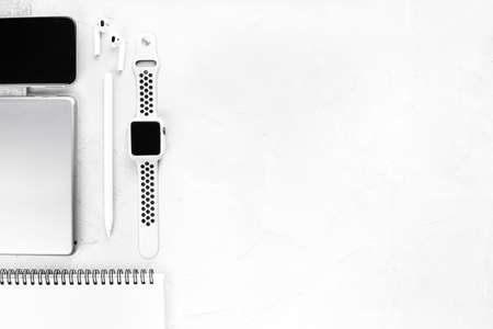 Modern workplace gadgets to boost productivity: smartphone, digital tablet, stylus pencil,...