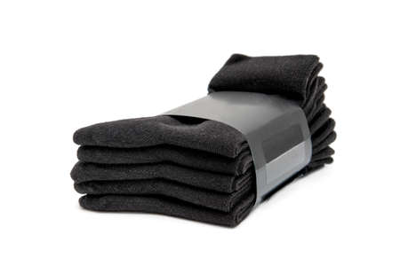 Pack of five black socks isolated on white.の写真素材