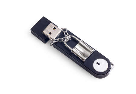Close-up of an open flash drive with small steel padlock on a chain. Data security and privacy...