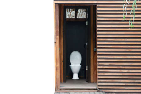 Open door to a public water closet of a summer bar with copy spaceの写真素材