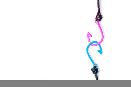 Blue and pink nautical braided rope bracelets hooked together isolated on white background. Sailing...