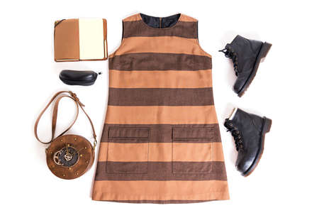 Trendy clothes and accessories fashion outfit flat lay.