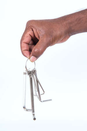 A man holding  drivers