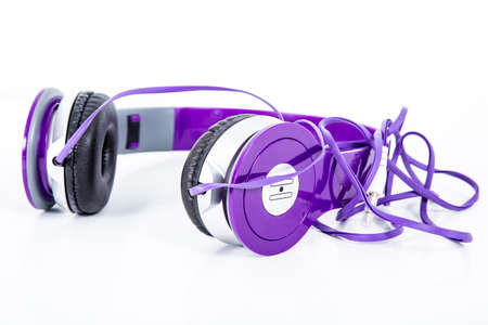Violet color Headphone in studio lightの写真素材