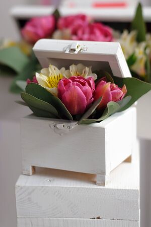 White open box with decorative flowersの写真素材