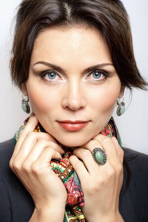 Portrait of a blue-eyed woman with makeupの写真素材