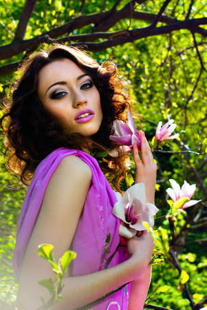 Beautiful Spring Girl with flowersの写真素材