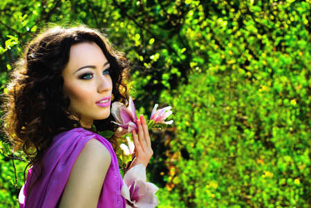 Beautiful Spring Girl with flowersの写真素材