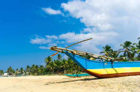 Traditional fisherman boat in Sri Lanka beachの写真素材