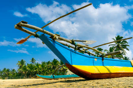 Traditional fisherman boat in Sri Lanka beachの写真素材