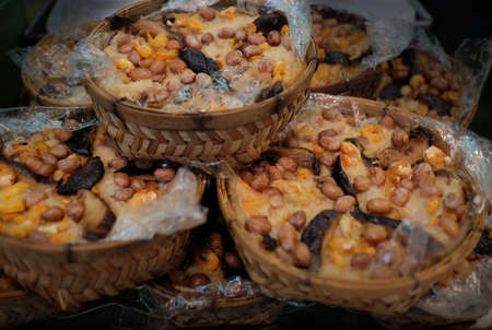 Chinese dumpling composed of mushroom, dried shrimp, are displayed at storefront.の写真素材