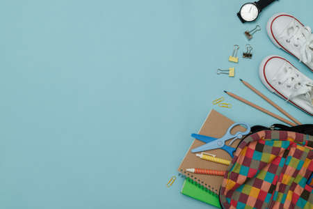 Top view school supplies on blue background with copy space.の写真素材