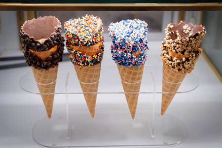 Four ice cream cones waiting for customers.の写真素材