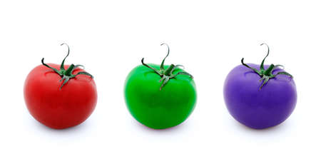 Conceptual illustration of three tomatoes in RGB colours placed in straight line over white background.の写真素材