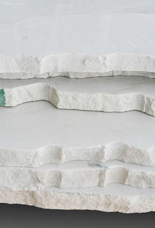 Raw, sawn marble blocks with rugged bordersの写真素材