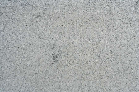Sawn granite slab with raw, natural surface. Granite stone texture.の写真素材