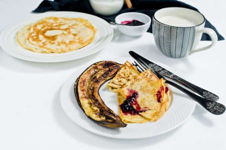Gluten-free and lactose-free pancakes. Ingredients: gluten-free flour, oat milk, quail eggs. White background, top view, close upの写真素材