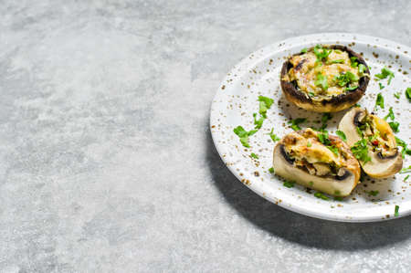 Baked Portobello mushrooms. Gray background, top view, space for textの写真素材
