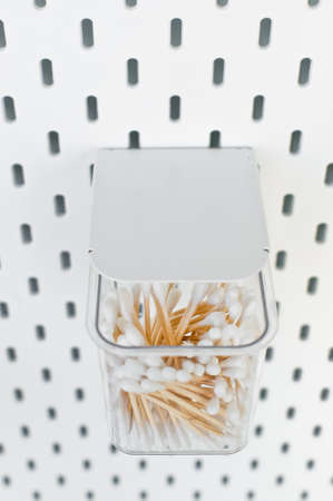 eco natural bamboo ear sticks flat lay on white background. sustainable lifestyle concept. Side...