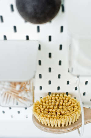 Zero waste bathroom accessories, natural sisal brush. Eco body, showers brush. Copy space. white backgroundの写真素材