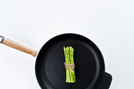 Organic mini asparagus. White background, top view, space for textの写真素材