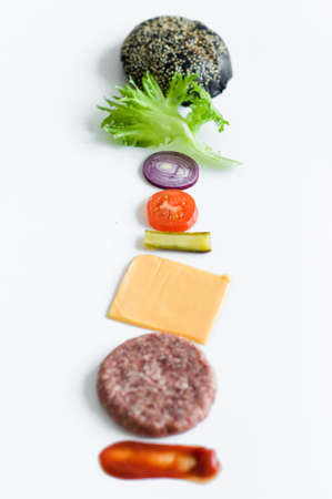 Ingredients for the black Burger over white backgroundの写真素材