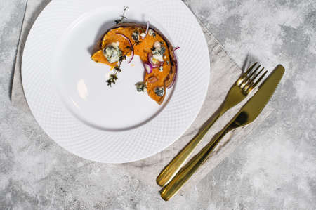 Baked pumpkin with Gorgonzolaの写真素材