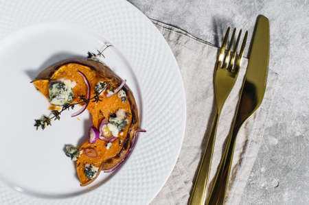 Baked pumpkin with Gorgonzolaの写真素材