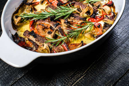 beef shish kebab with garnish of champignons, bell peppers and corn.の写真素材