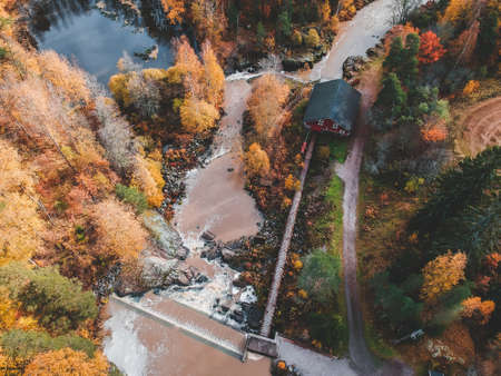 Aerial view of waterfall, river rapids and ancient mill. Photo taken from a drone. Finland, Pornainenの写真素材