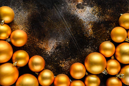 The new year 2020. Golden Christmas toys. Minimalistic design. Selective focus. space for textの写真素材