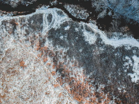 Aerial view of the forest and river at winter. Trees are covered with snow. Winter. snow-covered fields. Finland.の写真素材