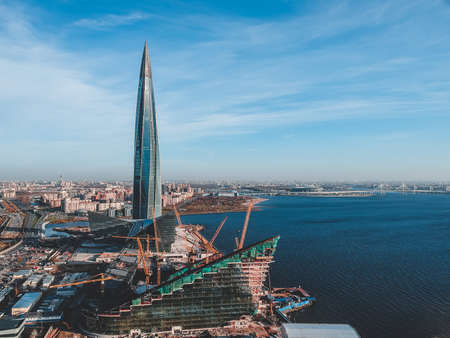 Ariel view panorama of the city from a bird's eye view, modern skyscraper on the background and...