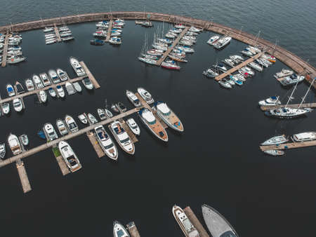 Aerialphoto yacht club with a breakwater. Yachts, motor boats, sailboats, berths, piersの写真素材