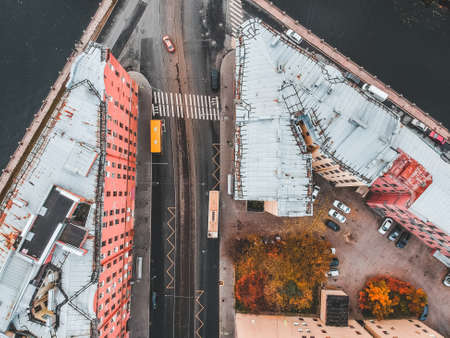 Aerial view of the old town, the roofs of historic houses, roads, car traffic. St. Petersburg, Russiaの写真素材